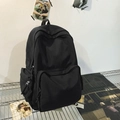 Minimalist black canvas laptop backpack with multi-pocket design for daily commuting - Black