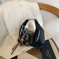 Glossy black patent leather hobo handbag with metal buckle and woven strap ornament - Black