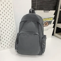 Sac à dos gris foncé minimaliste à grande capacité avec de multiples poches utiles - Gris
