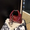 Vintage burgundy patent leather dumpling bag with woven rope charm and silver buckle - Red