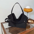 Matte black oversized tote bag with silver metal rivets and detachable shoulder strap - Black