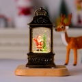 Gros plan d'une lanterne de Noël vintage avec Père Noël et paillettes scintillantes - Père Noël Bronze