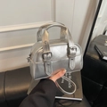Silver metallic mini bowling bag with belt buckle details and twin handles - Silver