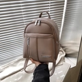 Women's light brown mini backpack in premium textured leather with multi-pocket design - Khaki