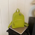 Mini lime green faux leather backpack with pebble texture and silver metal zippers - Green