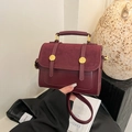 Retro British style crossbody bag in burgundy leather with gold buckle detail - Burgundy