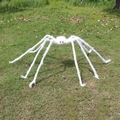Close-up of a giant white plush spider with red eyes for Halloween outdoor lawn decoration - 125cm / Single Pack / White