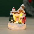 Detailed view of LED Christmas snow house with Santa Claus and warm yellow lighting - Santa Claus With Bell (YL2621A)