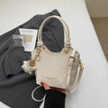 Cream white oil wax leather tote bag with plush charm and adjustable shoulder strap - With Plush Charm / Off White