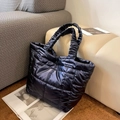 Black quilted down tote bag featuring stylish ruched handles and glossy nylon finish - Blue