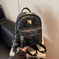 Black pebbled leather backpack with grey bear print and metallic bear keychain - Black with Pendant