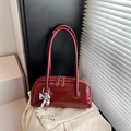 Vintage dark red Boston shoulder bag with silver bow charm and white stitching. - Wine Red with Pendant / Burgundy