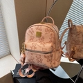 Pink lychee leather mini backpack featuring teddy bear prints and gold logo plate - Pink with Pendant