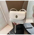 Detail of white leather shoulder bag with gold metal twist lock and CLEAROK logo - Off White