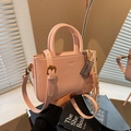 Pink minimalist faux leather square bag with top handles and adjustable shoulder strap - Pink