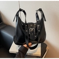 Detail of black glossy oiled leather handbag with silver square buckle and metal eyelets - Black