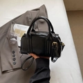 Glossy black patent leather Boston bag with gold hardware and adjustable strap - Black