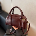 Elegant deep burgundy oil wax leather Boston handbag with gold-tone hardware detail - Burgundy