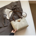 Retro canvas bucket bag in beige with brown leather trim and adjustable crossbody strap - No Pendant / Off White