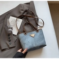Distressed denim bucket bag with brown leather trim and knotted handle detail - No Pendant / Blue