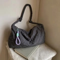 Dark grey quilted puffer tote bag with knotted shoulder strap and colorful rope charm - Dark Gray
