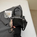 Black glossy pillow bag with white Z-stitch details and stylish rope charm accessory - Black (With Charm)