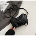 Minimalist black leather crossbody bag with silver buckle and elegant side charm - Small / Black