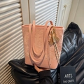 Pink embossed star pattern underarm tote bag with a unique tennis racket charm decoration - With Charm / Pink