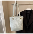 Light blue faux leather tote bag with embossed star pattern and metal rings - No Pendant / Blue