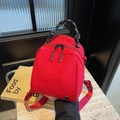 Red shell-shaped nylon backpack with black and white braided rope handle for women - Red