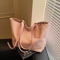 Light pink tote bag with woven texture and zipper closure for daily commute - Pink