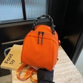 Mini shell-shaped crossbody bag in vibrant orange nylon with woven rope handle - Orange