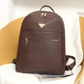 Deep brown faux leather backpack with retro texture and metal triangle detail - Brown