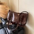 Deep brown vintage messenger tote bag with silver eyelets and adjustable straps - Brown