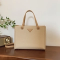Beige woven tote bag with brown leather handles and adjustable crossbody strap - Khaki