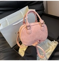 Pink suede-textured Boston bag with dual handles and adjustable long shoulder strap - Pink (No Charm)