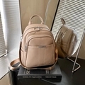Chic beige pebbled leather backpack with metallic accents and adjustable straps - Khaki