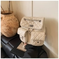 Detail of quilted beige backpack featuring silver metal turn-lock and chain straps - Off White