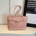 Light pink woven tote bag with slim shoulder straps and decorative buckle detail - Pink