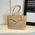 Chic beige woven tote bag with smooth leather trim and stylish metal hardware accents - Apricot