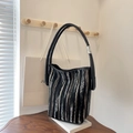 Striped woven bucket bag in black white and grey with premium black leather handle - Black