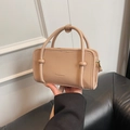 Elegant beige rectangular box handbag with cylindrical handles and adjustable strap - Apricot No Pendant