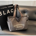 Dark grey canvas tote bag with brown leather handles and side pockets for women - Dark Brown