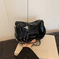 Glossy black mini crossbody bag with silver chain strap and metallic bead charm - Black