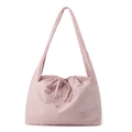 Détail du sac cabas en nylon rose clair avec fermeture à cordon et sa texture - Rose Pêche