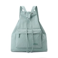 Detail view of light green nylon backpack with drawstring closure and metal eyelets - Soft Mist Green