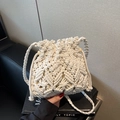 Handcrafted cream cotton rope crochet bucket bag with wooden beads and drawstring closure - Off White