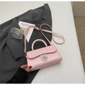 Roze minimalistische crossbodytas met zilveren cilindrische draaisluiting en handvat - Roze Zonder Hanger