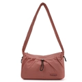 Detail of dusty rose nylon shoulder bag featuring ruched drawstring and wide strap - Berry Red