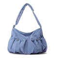 Close-up of fog blue nylon bag with pleated cloud design and dual drawstring pockets - Iris Blue